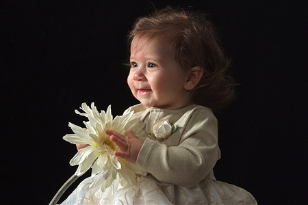Laney and Her Flower at 8 Months